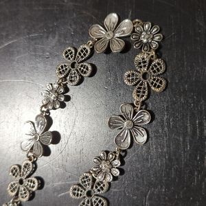 Long floral silver necklace